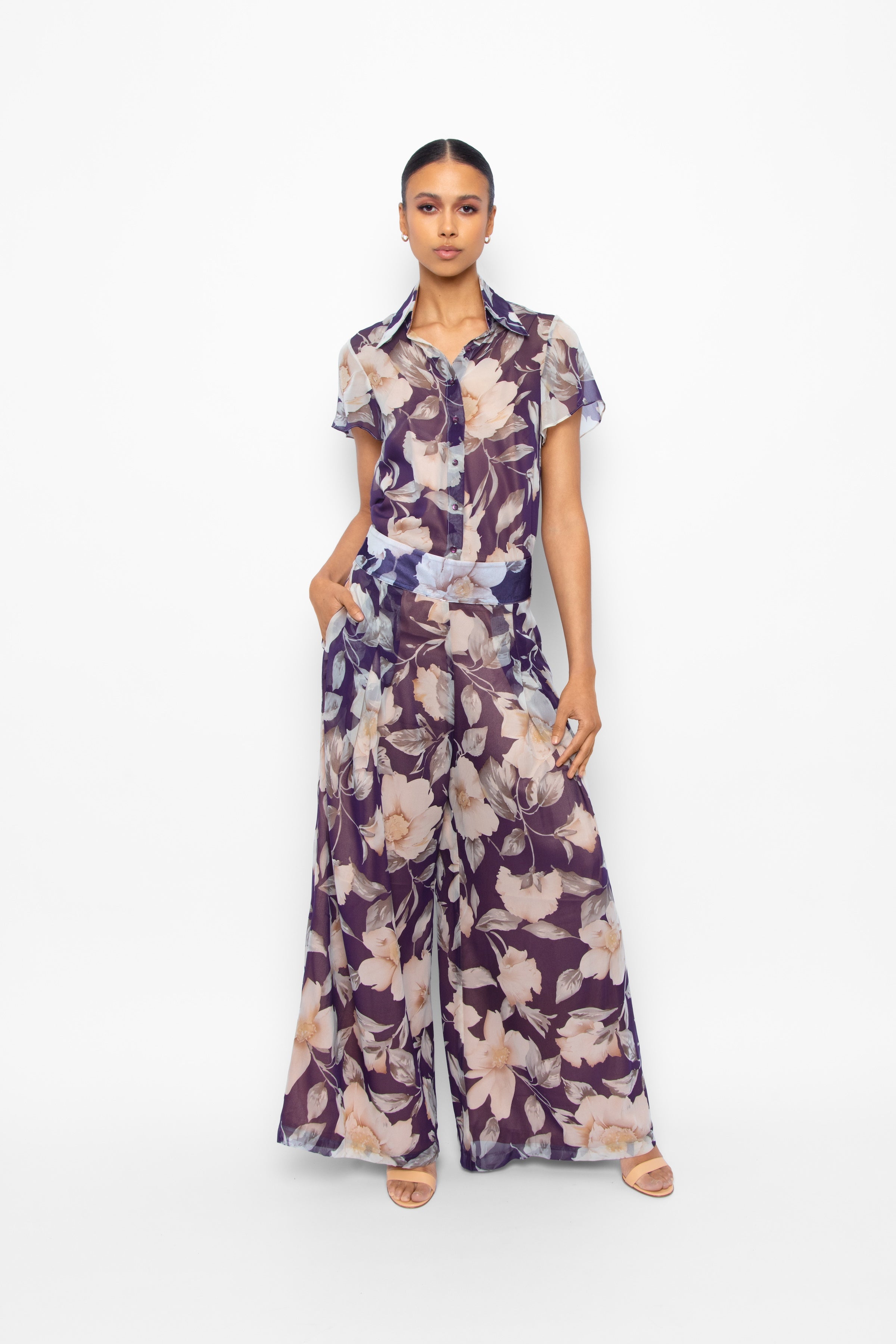 Maria Pants in Silk Chiffon Violet Floral Outer fully lined in Silk Charmeuse. Wide leg high waisted pants with back zip and side pockets. Shown here with matching Charlene Blouse.