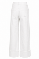 white jeans with heart shaped pockets